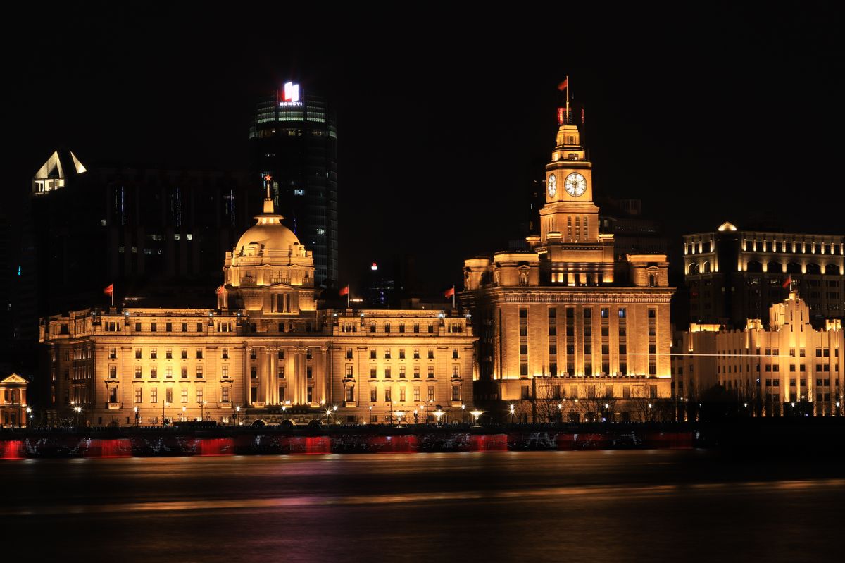 Shanghai Bund waterfront skyline lit up at night
