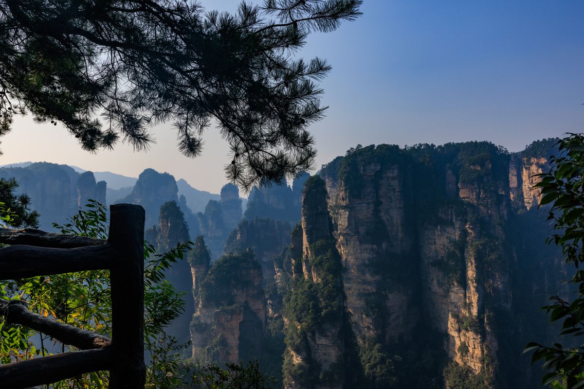 Towering sandstone pillars of Zhangjiajie in the mist